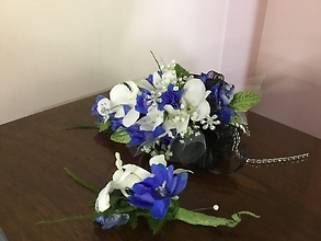 White Orchids and Blue Delphinium with Matching Boutonniere